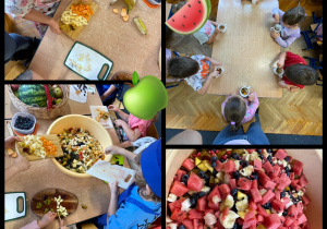 Dzieci wrzucają pokrojone owoce do dużej miski, widać też miskę z sałatką owocową.